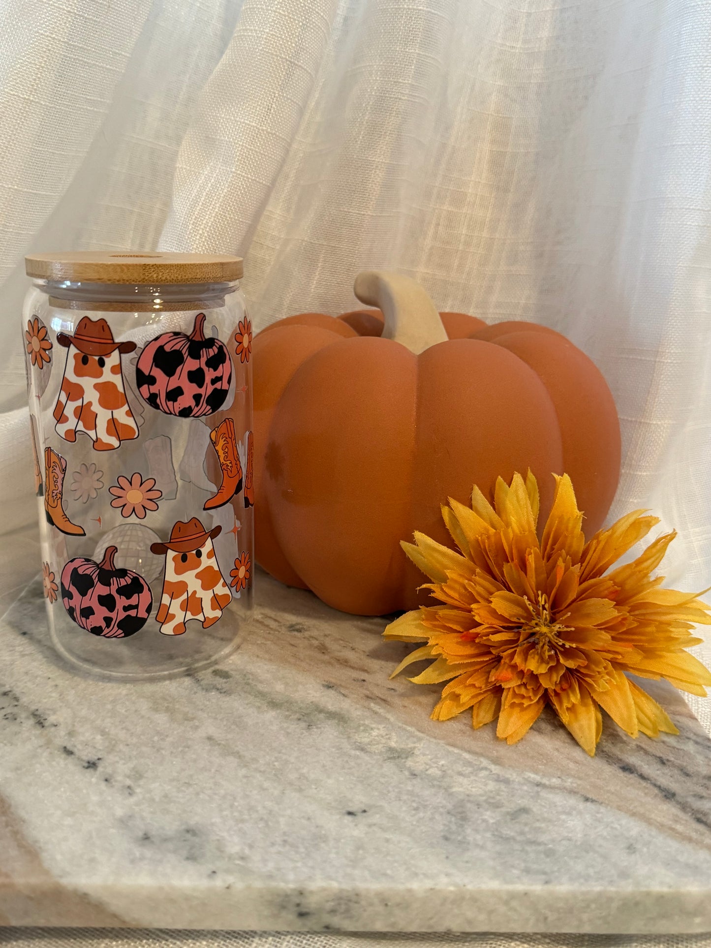 Glass cup with straw