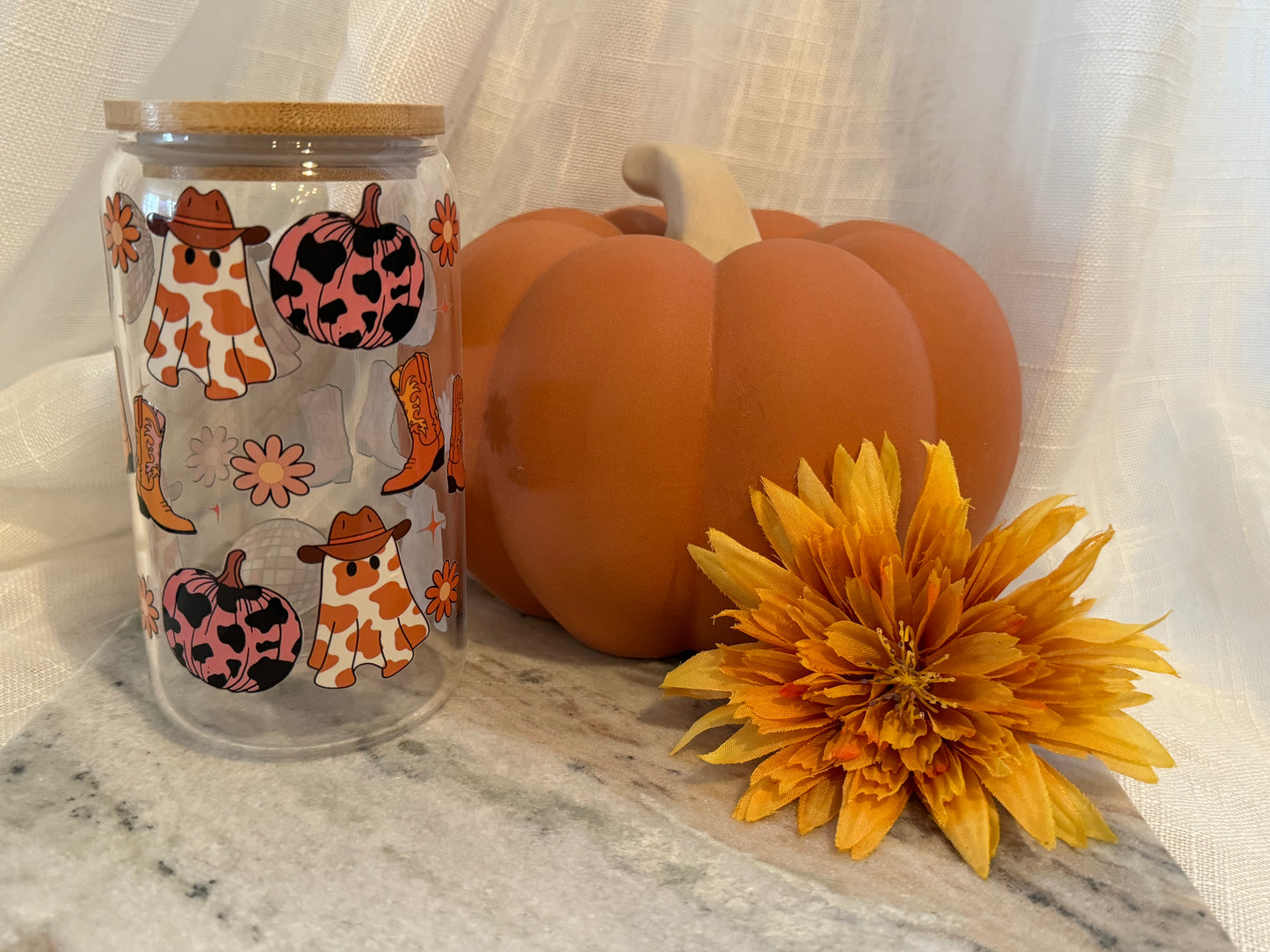 Glass cup with straw